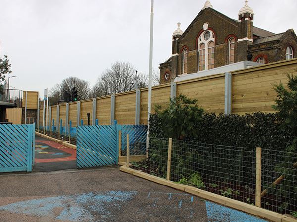 Acoustic fencing around school garden