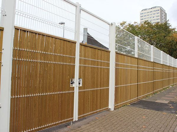 Steel mesh and timber fencing